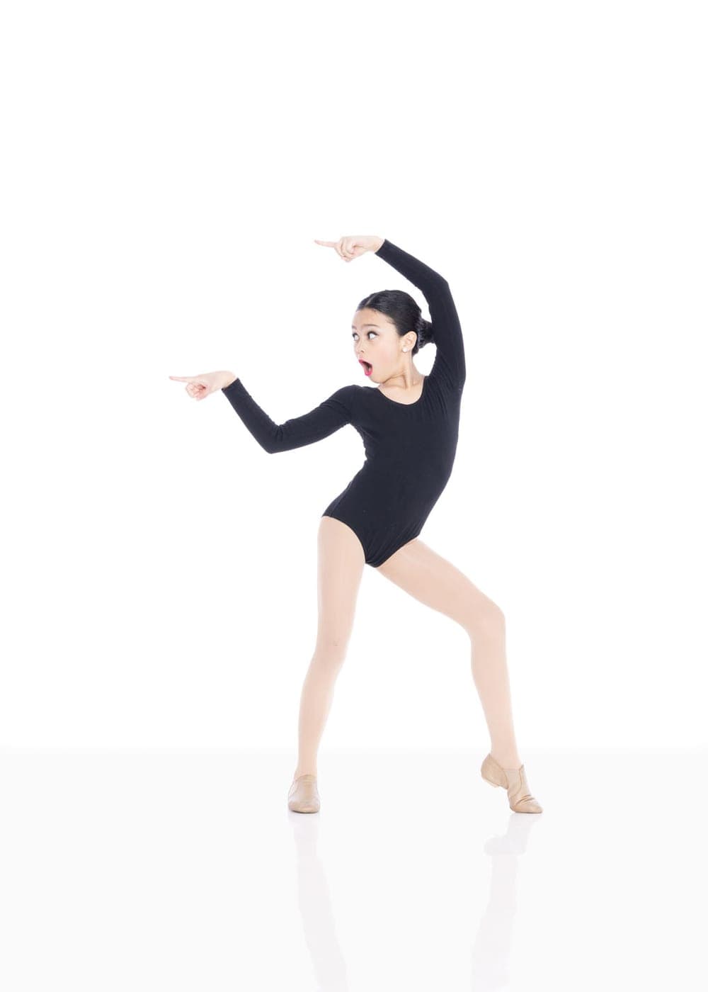 Young dancer in a black leotard striking a playful jazz pose